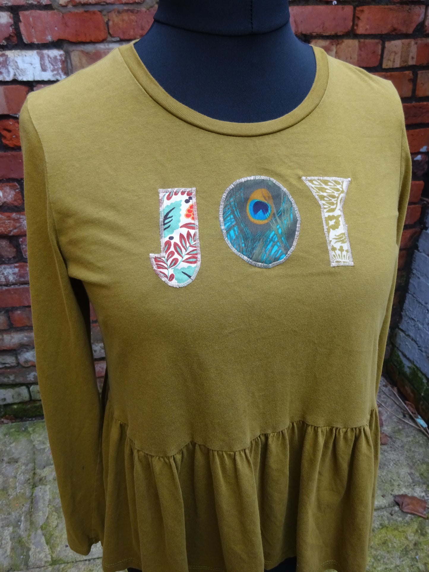 Sage green JOY peplum top